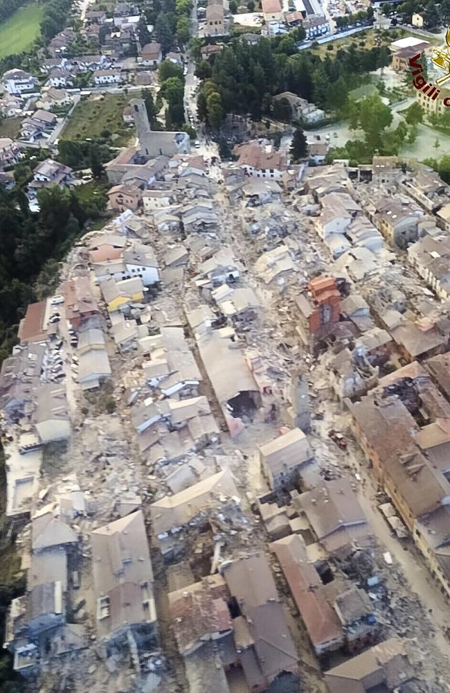(This aerial view shows the damage in the town of Amatrice, central Italy. Picture: Italian Firefighters Vigili del Fuoco. Source: AP)