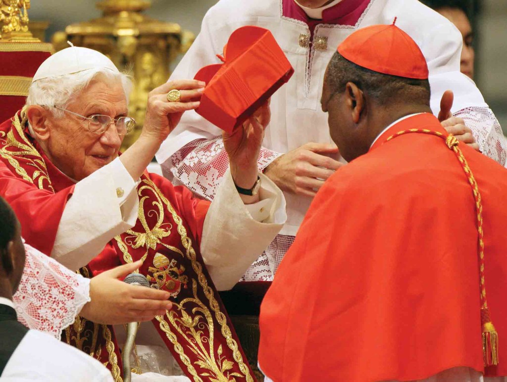 Nigerian Archbishop John Olorunfemi Onaiyekan, 68, of Abuja, receives the red biretta from Benedict XVI