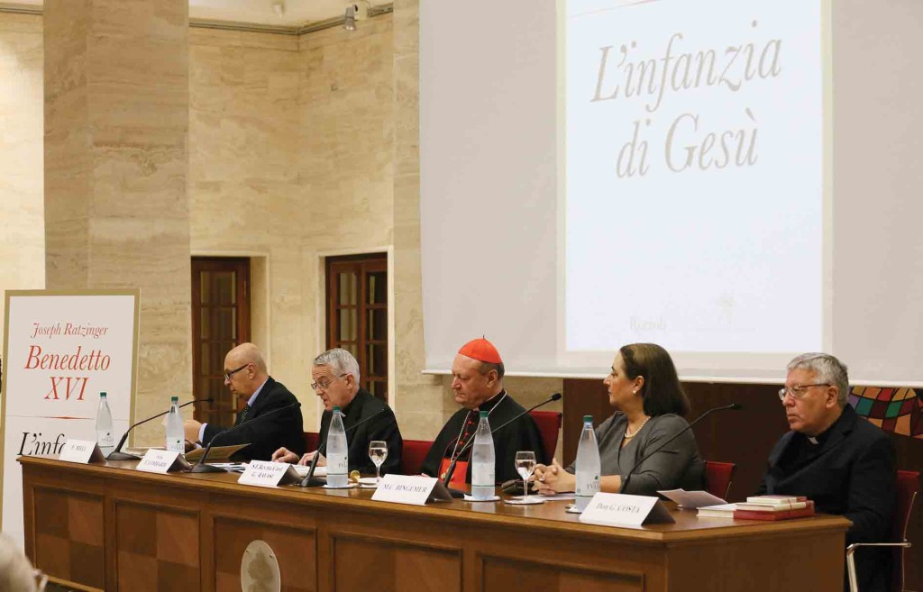 Cardinal Ravasi (center), with Fr. Giuseppe Costa, head of the Vatican Press, to the right, presents the book November 20.