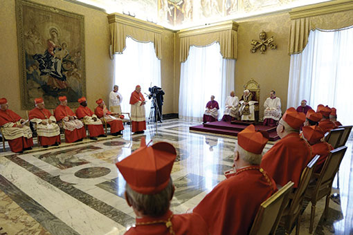 Benedict XVI attends a February 11 meeting with cardinals at the Vatican. During this meeting, he announced that he would step down from the papacy at the end of the month (CNS photo). 