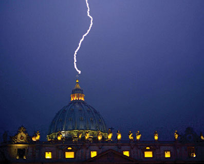 An image of the remarkable lightning bolt which struck St. Peter’s Dome at about 6 pm in the evening on Monday, February 11; the Pope had announced his decision to renounce his office at about 11:40 am, about 6 hours earlier.