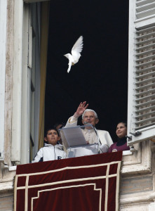Pope Benedict and two Italian schoolchildren watch after releasing a dove from the window of the Pope’s apartment overlooking St. Peter's Square at the Vatican January 29. After praying the Angelus, the Pope and the children released doves as a symbol of peace.