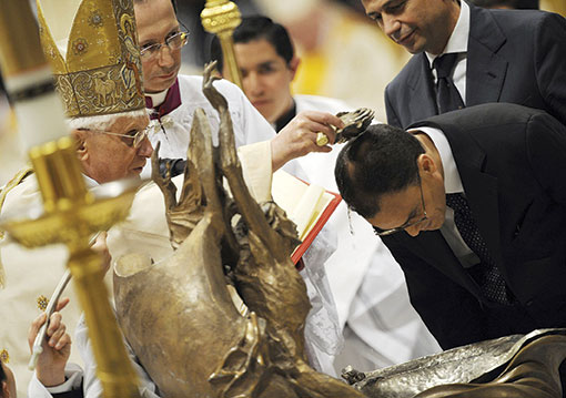 Pope Benedict baptizes Magdi Allam as he celebrates the Easter Vigil in St. Peter’s Basilica at the Vatican March 22, 2008 (CNS photo)