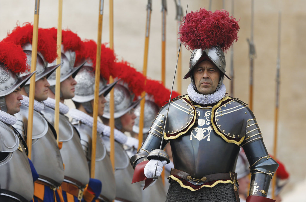Lt. Col. Christoph Graf, vice commander of the Swiss Guard, reviews Swiss Guards before Pope Francis' Christmas message and blessing “urbi et orbi” at the Vatican December 25, 2014.