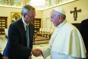 Pope Francis shakes hands with Eric Schmidt, executive chairman of Google, during a private meeting at the Vatican Jan. 15. (CNS photo/L'Osservatore Romano via Reuters)