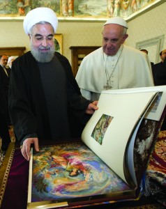 Iranian President Hassan Rouhani (exchanges gifts with Pope Francis during a private meeting at the Vatican Jan. 26. (CNS photo/Andrew Medichini, pool via Reuters) See POPE-ROUHANI Jan. 26, 2016.