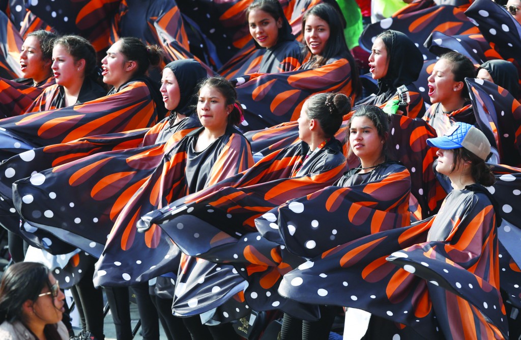 Girls dressed as monarch butterflies perform as Pope Francis meets with young people at the Jose Maria Morelos Pavon Stadium in Morelia, Mexico, Feb. 16. The area is host to monarch butterflies who migrate from Canada during the winter. (CNS photo/Paul Haring) See POPE-MEXICO-YOUTH Feb. 16, 2016.