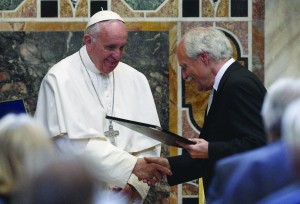 Pope Francis accepts the Charlemagne Prize from Jurgen Linden, president of the Society for the Conferral of the Charlemagne Prize, during a ceremony in the Sala Regia at the Vatican May 6. (CNS photo/Paul Haring) See POPE-DREAM-EUROPE-CHARLEMAGNE May 6, 2016.
