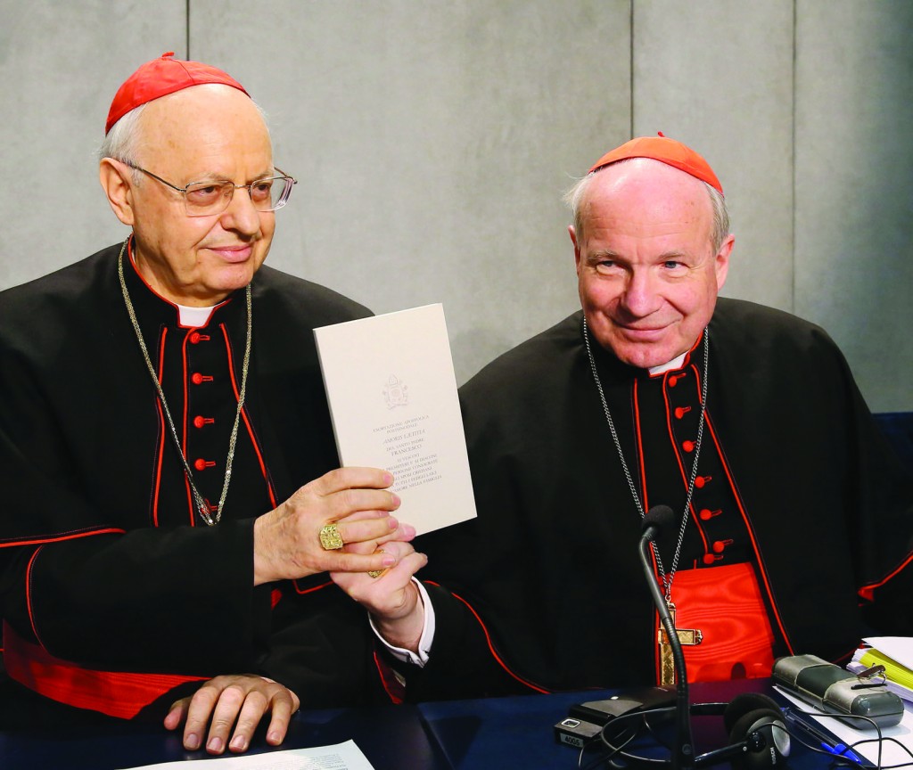 8/04/2016 Vatican City. Press conference presenting Pope Francis' Post-Synodal Apostolic Exhortation "Amoris laetitia", on love in the family, in the Holy See Press Office. Cardinal Lorenzo Baldisseri, Secretary General of the Synod of Bishops, and Cardinal Christoph Schonborn O.P., Archbishop of Vienna, with a copy of the document. Photo Grzegorz Galazka.