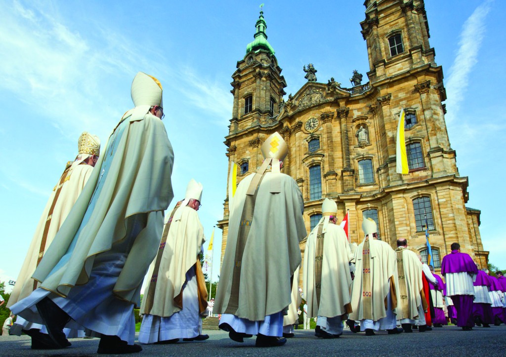 Bavarian bishops walk in procession to the Basilica of the Fourteen Holy Helpers near Bad Staffelstein, Germany, in this 2012 photo. Germany's Catholic bishops have urged efforts to overcome "destructive self-interest" on the 100th anniversary of World War I, while recognizing the shared guilt of churches for the conflict, which left 16 million dead. (CNS photo/Daniel Karmann, EPA) (July 28, 2014) See WWI-GERMANS, July 28, 2014.