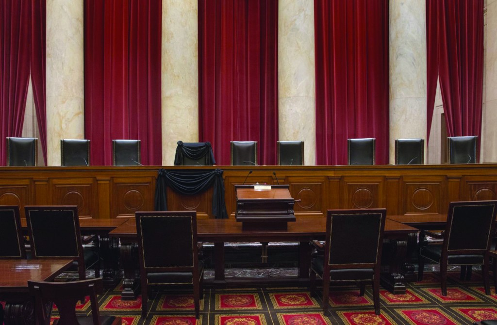 The Courtroom of the Supreme Court showing Associate Justice Antonin Scalia’s Bench Chair and the Bench in front of his seat draped in black following his death on February 13, 2016.