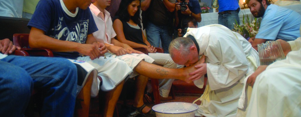Argentine Cardinal Jorge Mario Bergoglio washes and kisses the feet of residents of a shelter for drug users during Holy Thursday Mass in 2008 at a church in a poor neighborhood of Buenos Aires, Argentina. The 76-year-old Jesuit became the first Latin American pope March 13, taking the name Francis. (CNS photo/Enrique Garcia Medina, Reuters) (March 15, 2013) See POPE-ELECT (UPDATED) March 13, 2013.
