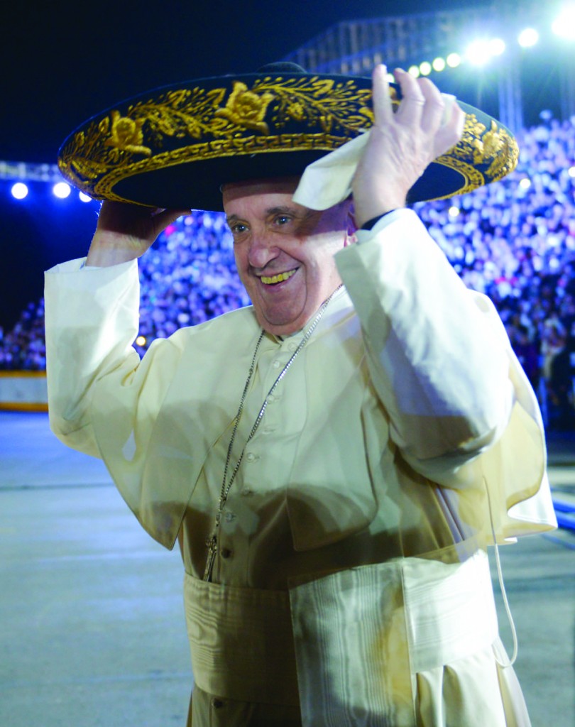 Pope Francis wears a sombrero during his arrival to Mexico City Feb. 12. (CNS photo/Gustavo Camacho, Presidency of Mexico via Reuters) See POPE-MEXICO-WELCOME Feb. 12, 2016. Editors: editorial use only.