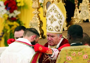Bishop Bernard Fellay, superior of the Society of St. Pius X, ordains a priest during a ceremony in Econe, Switzerland, June 29. The Vatican has said it considers such ordinations "illegitimate," although the priests are validly ordained. Earlier this year, Pope Benedict XVI lifted the excommunication of Bishop Fellay and three other bishops of the traditionalist society. (CNS photo/Denis Balibouse, Reuters) (June 29, 2009)