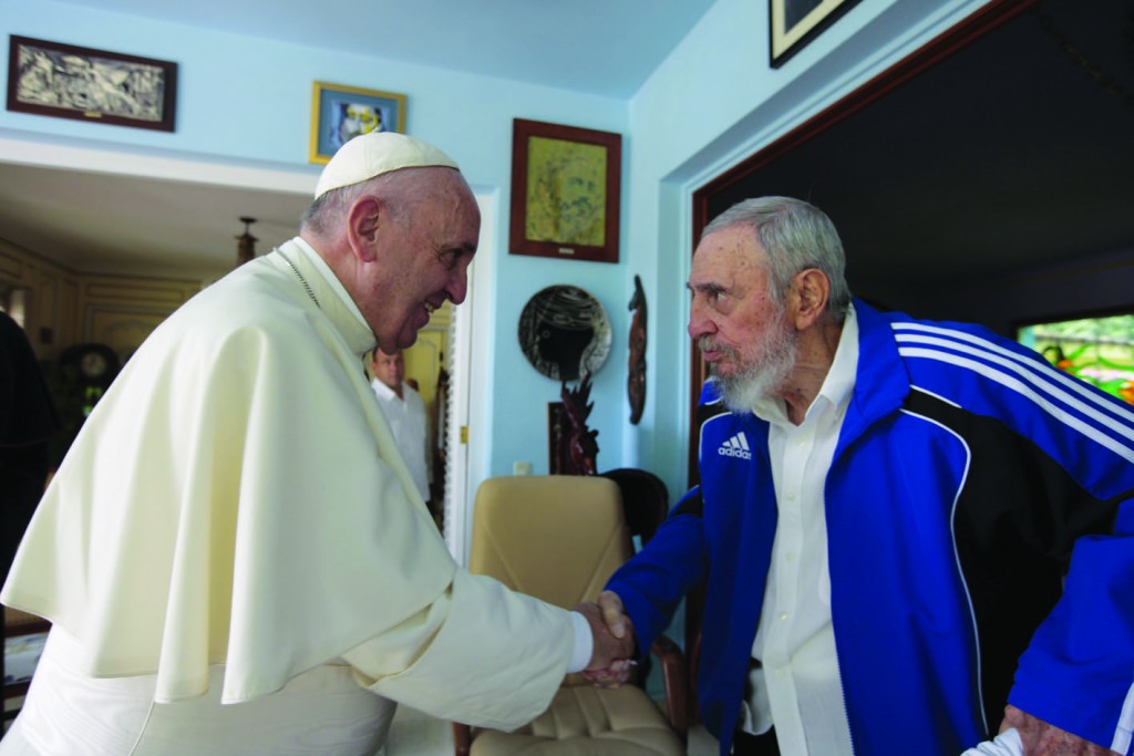 Pope Francis shakes hands with former Cuban President Fidel Castro at Castro's residence in Havana Sept. 20. (CNS photo/Alex Castro, Castro family handout via Reuters) See POPE-CASTRO Sept. 20, 2015.