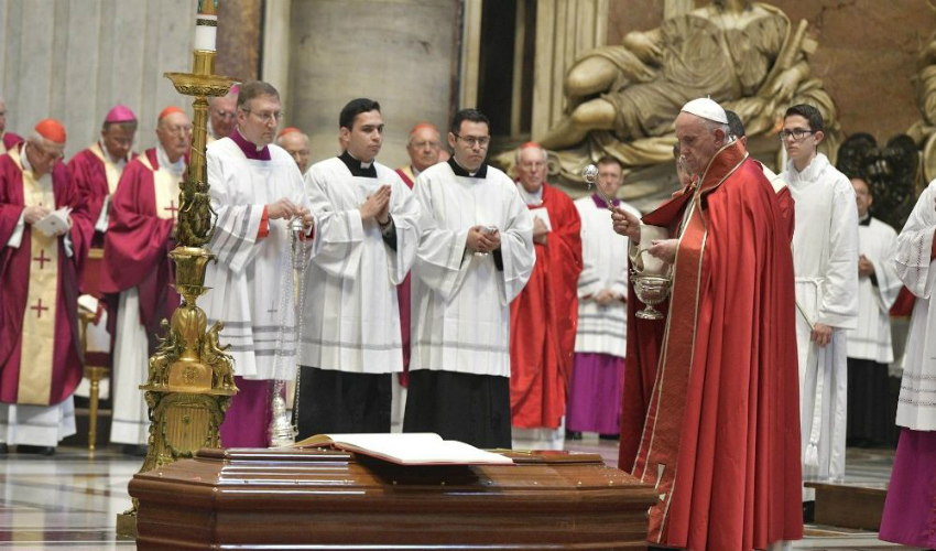 Pope Francis incenses the coffin of the late Cardinal Elio Sgreccia in St. Peter's Basilica on Friday, June 7.